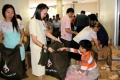 th:president:news:2014_news:2014_07_28_packing600helpingfloodsrisaket:4.jpg